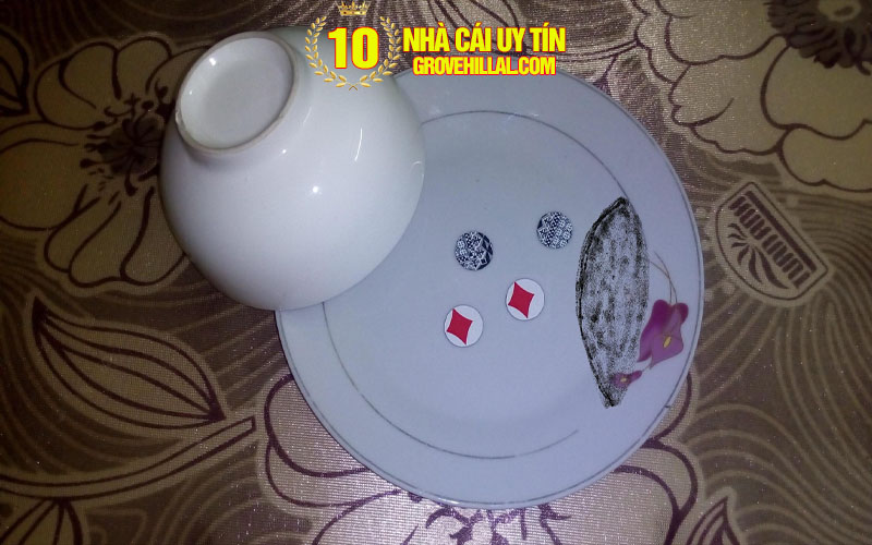 1 luat choi xoc dia Luật chơi xóc đĩa